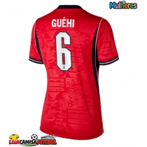 Camisa de Futebol Inglaterra Marc Guehi #6 Equipamento Secundário Mulheres Mundo 2026 Manga Curta